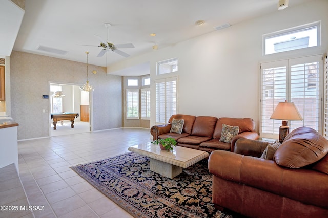 living room with ceiling fan, billiards, and light tile patterned floors