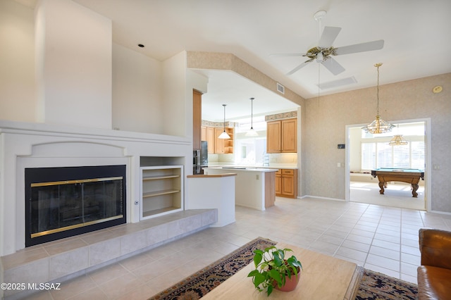 unfurnished living room featuring pool table, light tile patterned floors, and ceiling fan