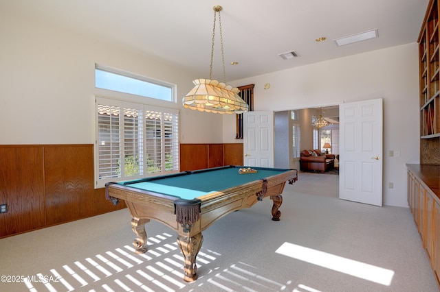 playroom with wooden walls, pool table, and light colored carpet