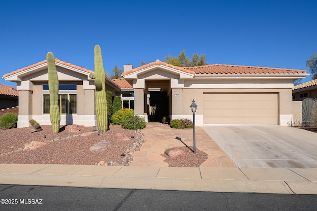 view of front of home with a garage