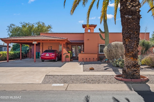 view of front of property with a carport