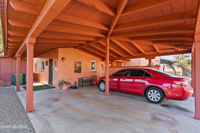 view of car parking featuring a carport