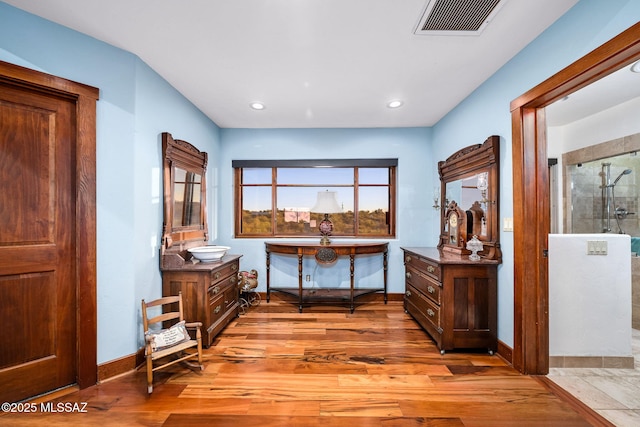 hallway featuring light hardwood / wood-style flooring