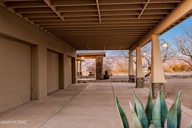 view of patio with a mountain view