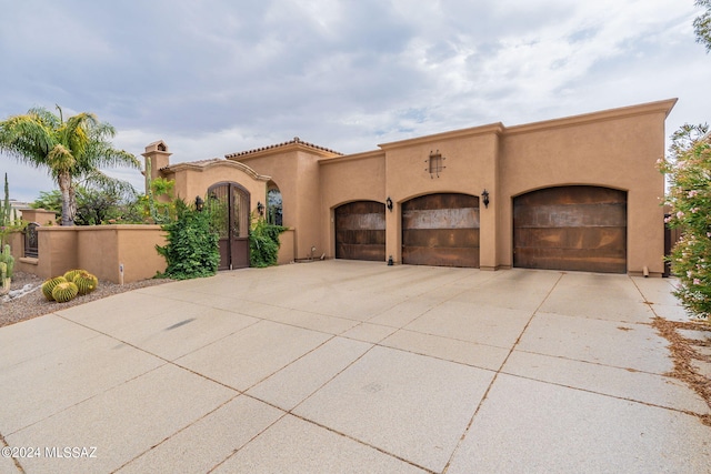 view of front of home with a garage