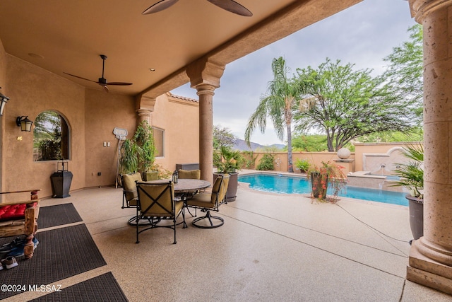 view of patio featuring a fenced in pool