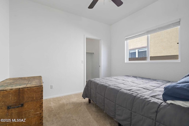 bedroom with ceiling fan and carpet flooring