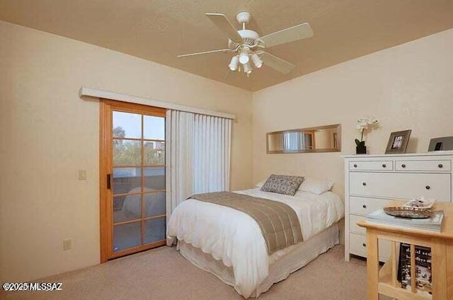 bedroom featuring ceiling fan, access to exterior, and light carpet