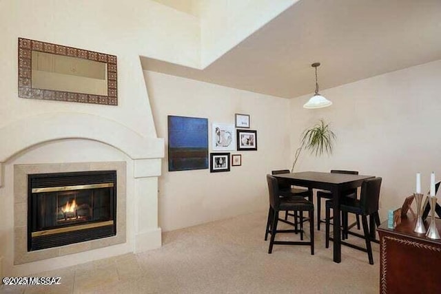 dining area featuring a fireplace