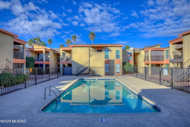 view of swimming pool featuring a patio