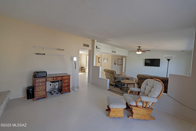 living room featuring ceiling fan