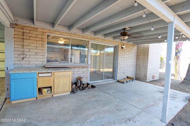 view of patio / terrace with ceiling fan