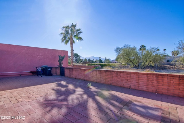 view of patio / terrace with a mountain view