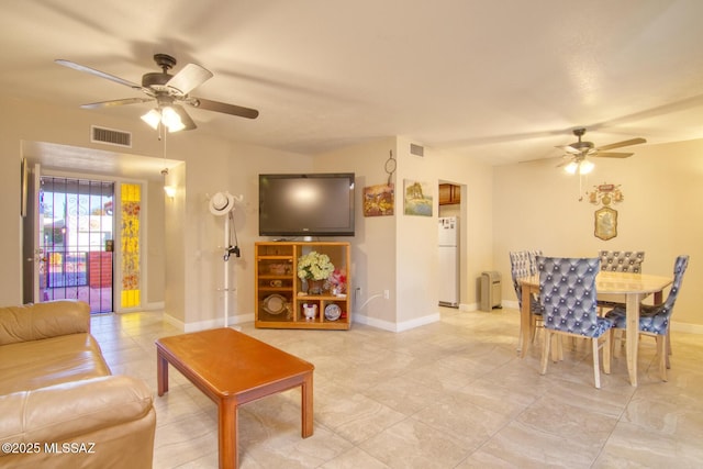 living room with ceiling fan