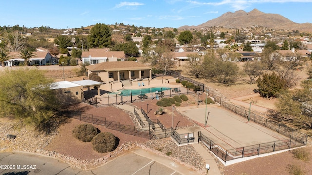 birds eye view of property featuring a mountain view