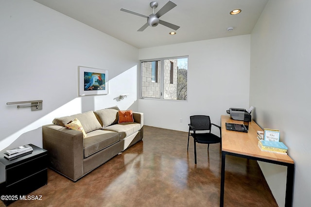 office area featuring finished concrete flooring, ceiling fan, and recessed lighting