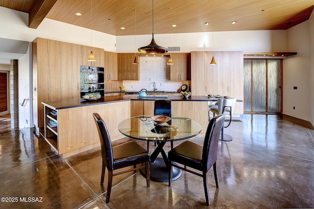 dining area featuring finished concrete flooring, beamed ceiling, wooden ceiling, and visible vents