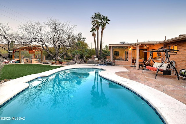 view of pool featuring a gazebo and a patio