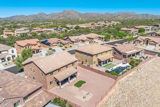 drone / aerial view featuring a mountain view