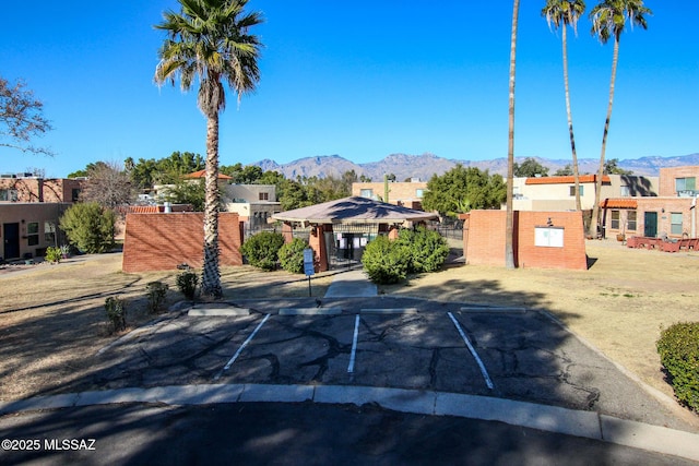 view of front of house with a gazebo and a mountain view