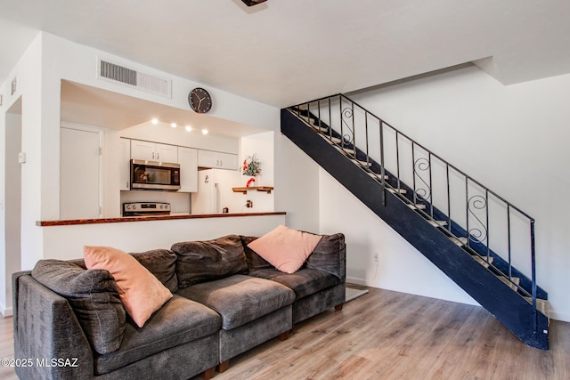 living room featuring light wood-type flooring