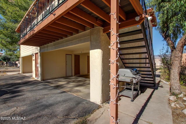 exterior space featuring area for grilling and a garage