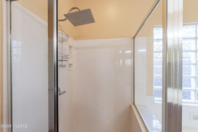 bathroom featuring walk in shower