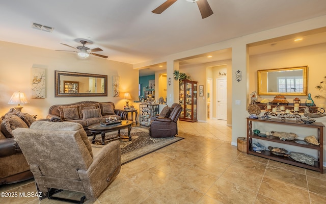 living room with ceiling fan