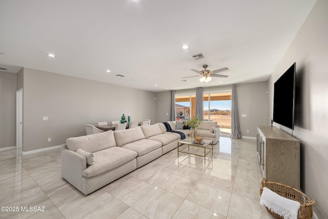 living room with ceiling fan