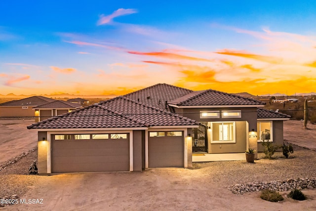 view of front of home with a garage