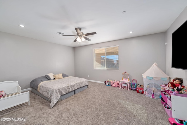 bedroom with ceiling fan and carpet flooring