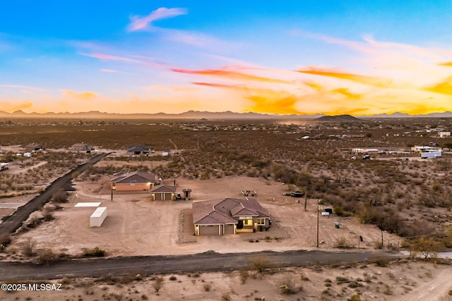 aerial view at dusk with a mountain view