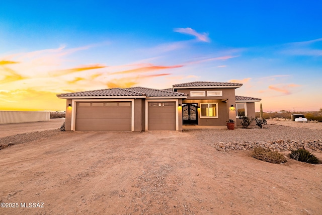 view of front of home featuring a garage