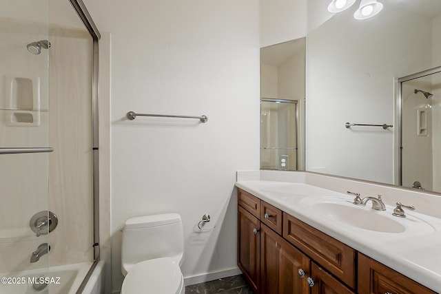 full bathroom featuring shower / washtub combination, toilet, vanity, and baseboards