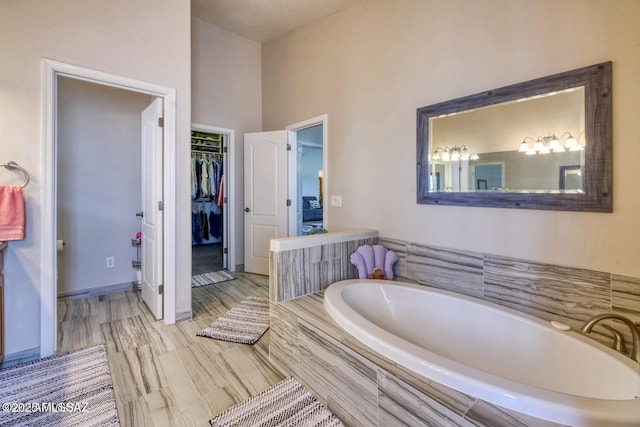 bathroom with tiled bath