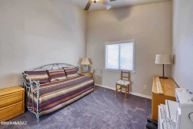 bedroom with ceiling fan and dark carpet