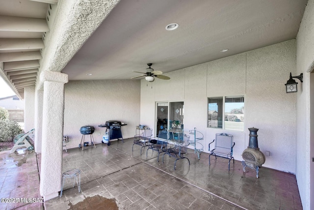 view of patio / terrace featuring ceiling fan and grilling area