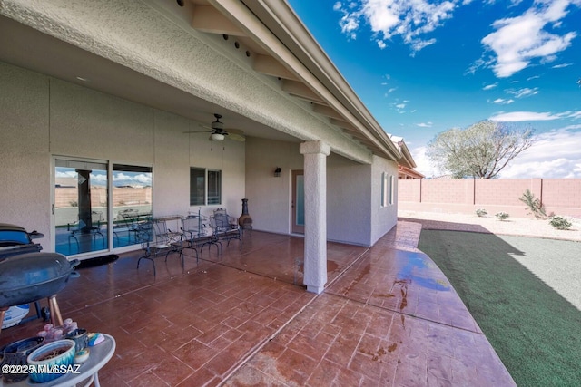 view of patio / terrace featuring ceiling fan