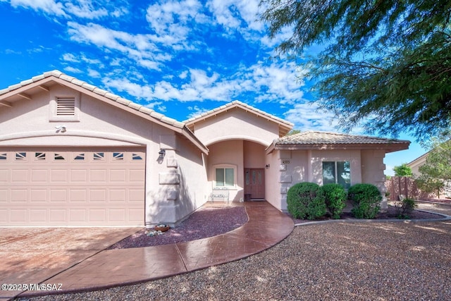 view of front of home with a garage