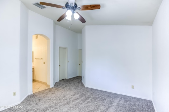 carpeted empty room with ceiling fan