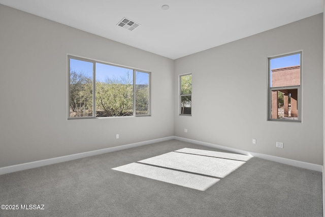 view of carpeted spare room