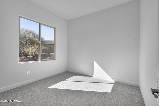 unfurnished room featuring carpet floors