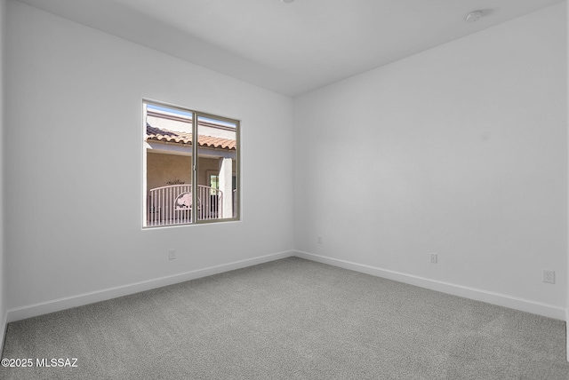 view of carpeted spare room
