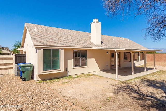 rear view of house with a patio area