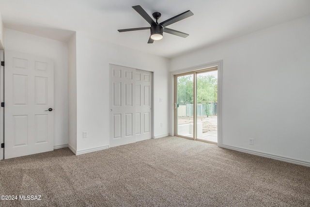 unfurnished bedroom featuring carpet floors, access to outside, and ceiling fan