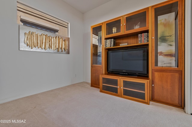 unfurnished living room with light carpet