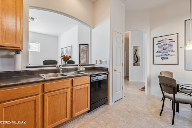 kitchen with light tile patterned flooring, black dishwasher, and sink