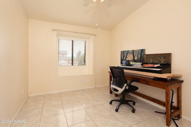 tiled office featuring vaulted ceiling and ceiling fan