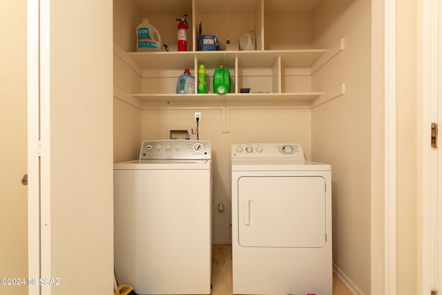 washroom with washer and clothes dryer