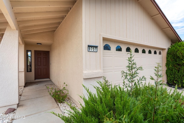 property entrance with a garage